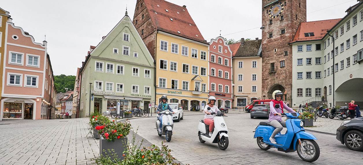 Vespa und Roller in der City